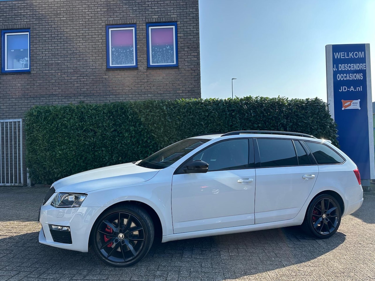 Skoda Octavia Combi - 2.0 TSI RS Climate C, Cruise C, RS Sportstoelen, Camera!!!! - AutoWereld.nl