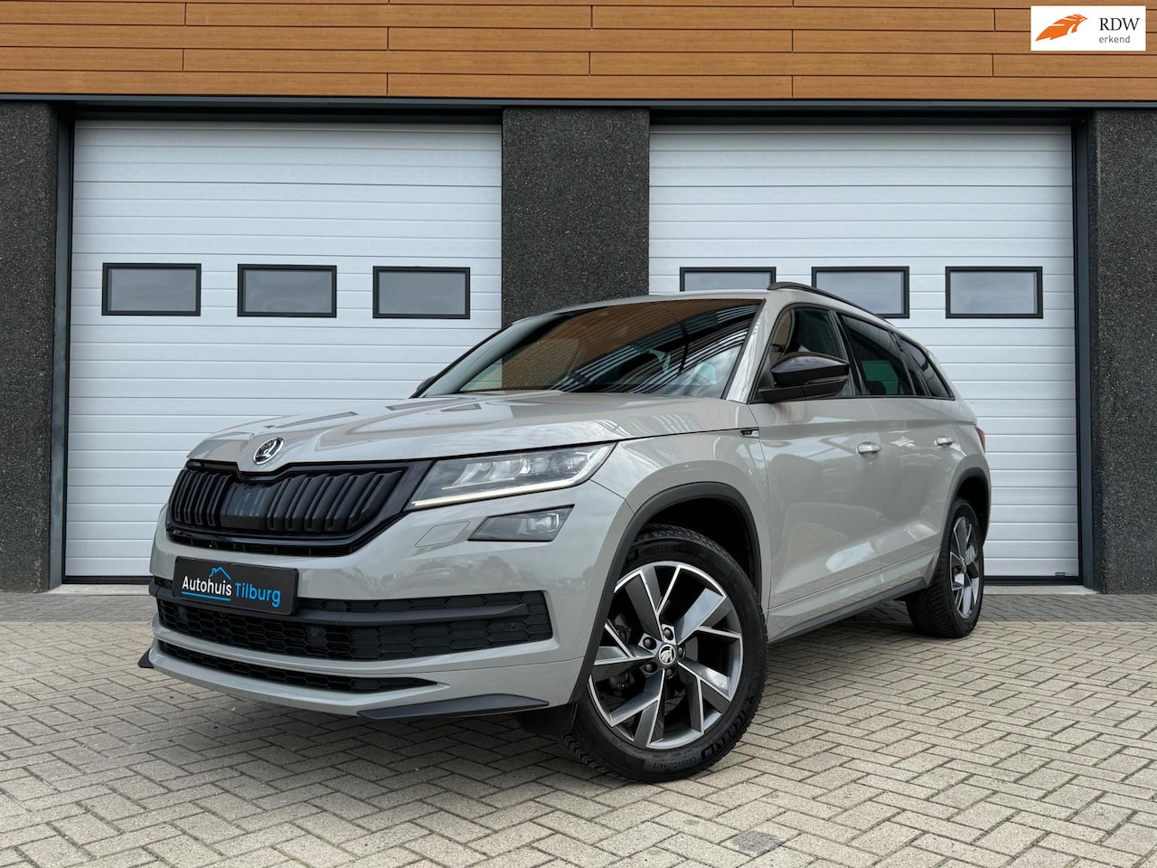 Skoda Kodiaq - 1.5 TSI Sportline Pano Navi Trekhaak Camera - AutoWereld.nl