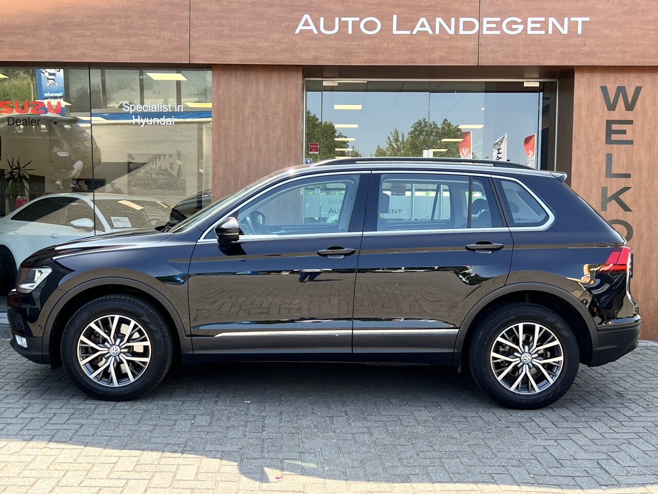 Volkswagen Tiguan - 2.0 TSI 4Motion Highline 2.0 TSI 4Motion Highline - AutoWereld.nl