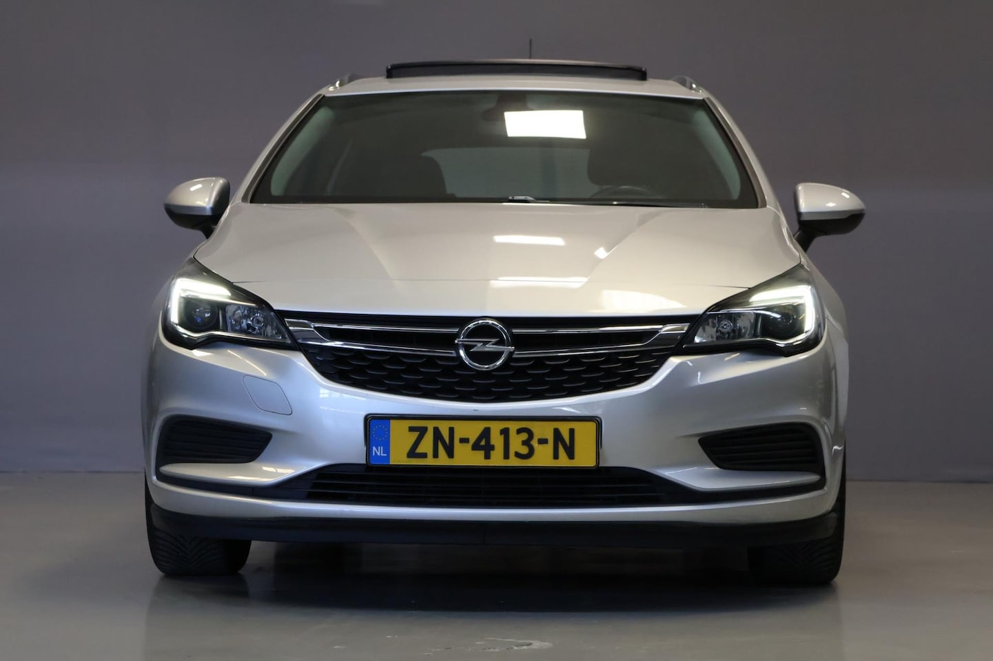 Opel Astra Sports Tourer - 1.4 Turbo 120 Jahre|Automaat|Pano|Carplay|Trekhaak - AutoWereld.nl