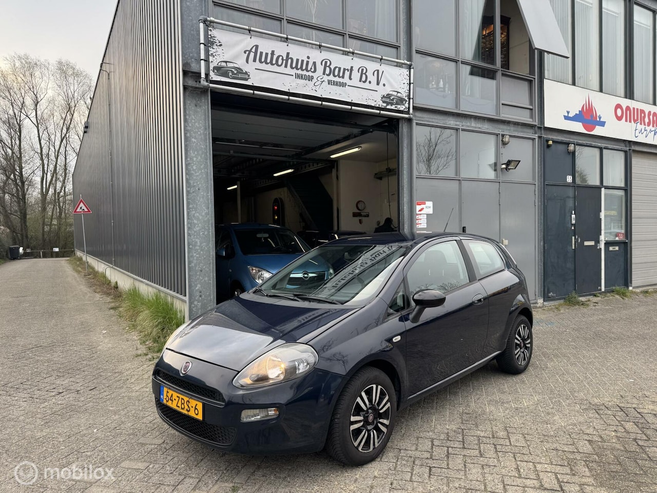 Fiat Punto Evo - 0.9 TwinAir Lounge Airco! Nieuwe APK! NAP Logisch! - AutoWereld.nl