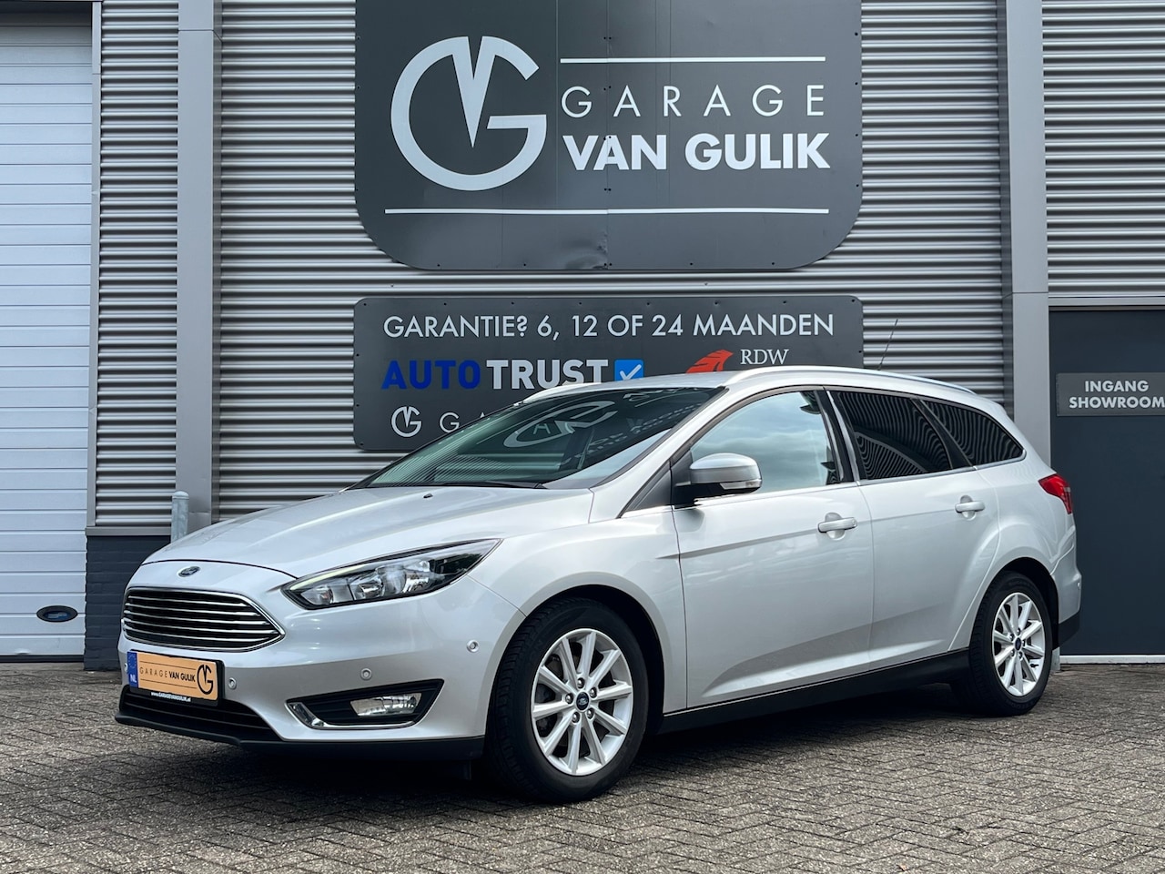Ford Focus Wagon - 1.0 Titanium 125PK Navi,Clima,Cruise,Isofix,Carplay,Stoel+StuurVerwarming,Parkeerhulp,Lmv, - AutoWereld.nl