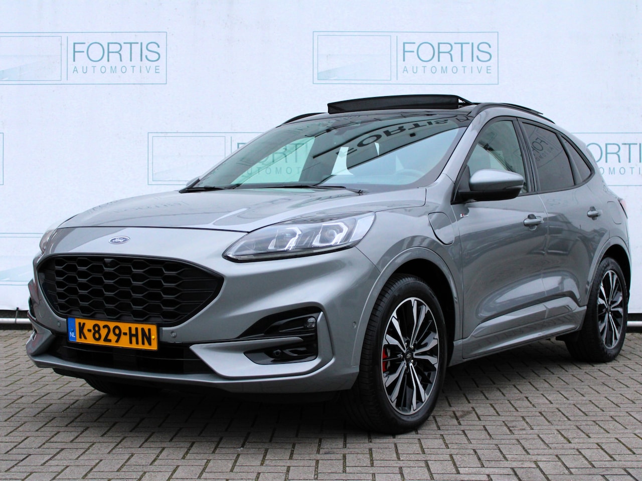 Ford Kuga - 2.5 PHEV ST-Line X NL AUTO | PANO | STUURWIEL VERW | STOELVERW | CAMERA | - AutoWereld.nl