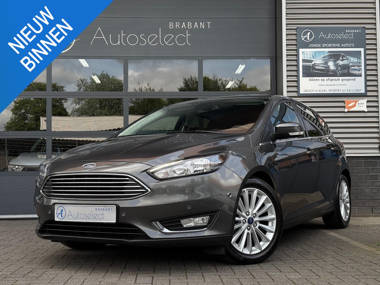 Ford Focus - 1.0 EcoBoost Titanium Clima Cruise Navi - AutoWereld.nl