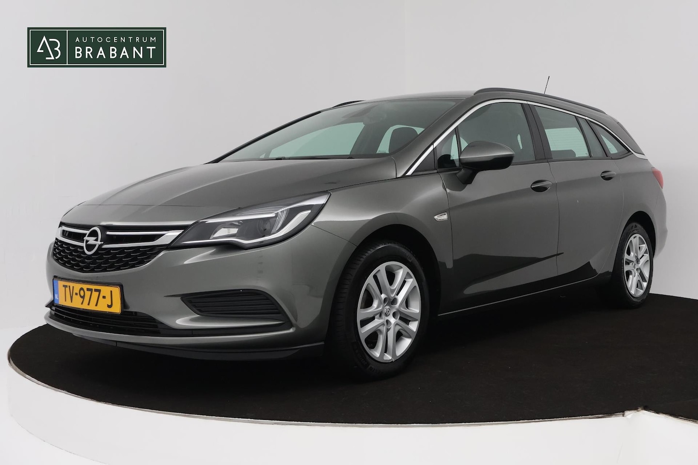 Opel Astra Sports Tourer - 1.4 Turbo Business+ (TREKHAAK, NAVIGATIE, LED, MULTIMEDIA , STUURBEDIENING) - AutoWereld.nl