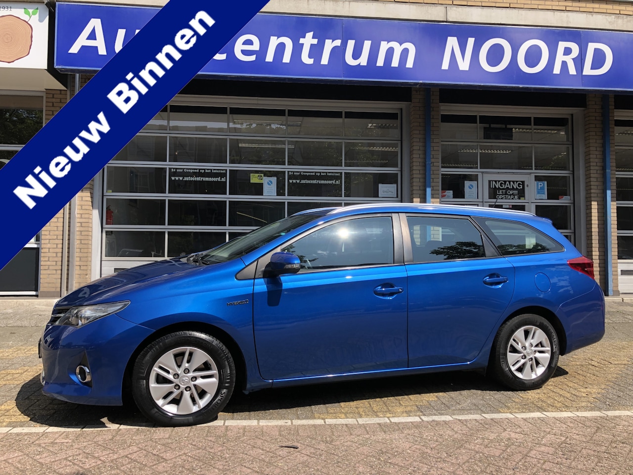 Toyota Auris Touring Sports - 1.8 Hybrid Aspiration | Climate Control | Cruise Control | Achteruitrijcamera | - AutoWereld.nl