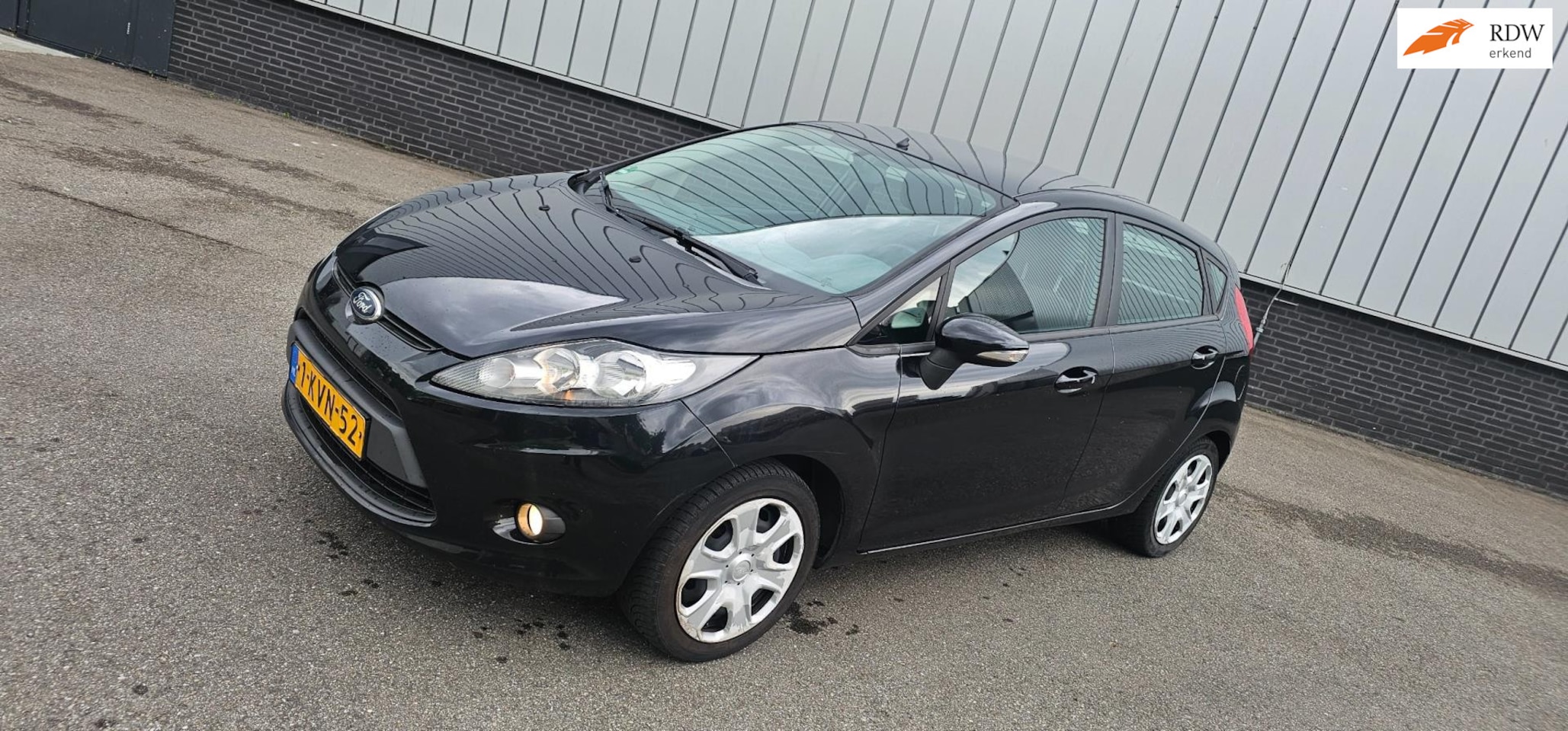 Ford Fiesta - 1.25 Ghia 1.25 Ghia - AutoWereld.nl