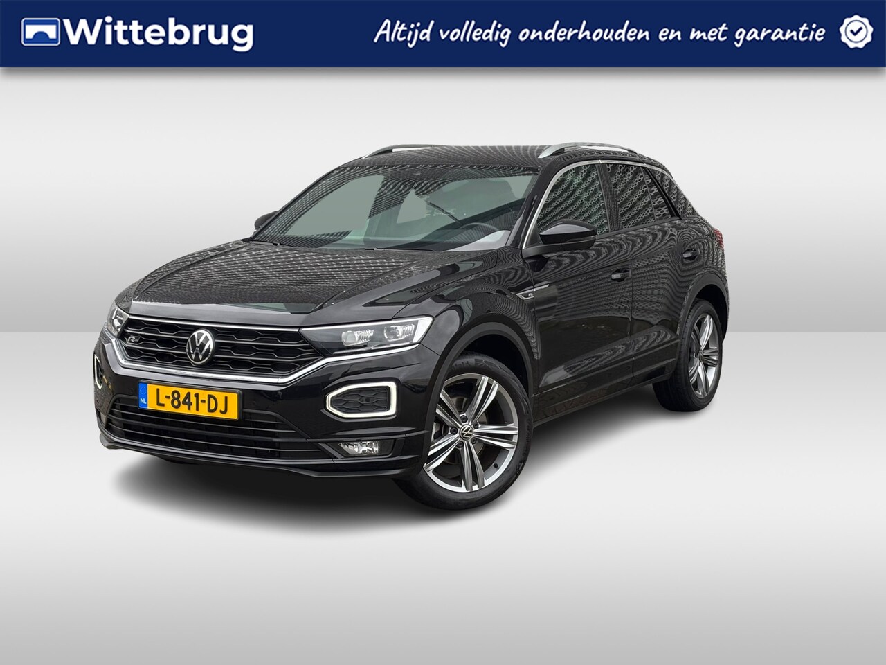Volkswagen T-Roc - 1.5 TSI Sport Business R / Digitaal dashboard / LED / Navigatie / Elektrische achterklep / - AutoWereld.nl