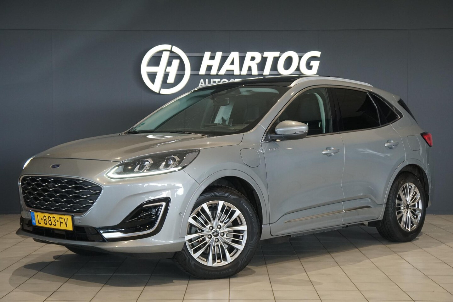 Ford Kuga - 2.5 PHEV Vignale + PANORAMA / HEAD-UP / LEDER - AutoWereld.nl