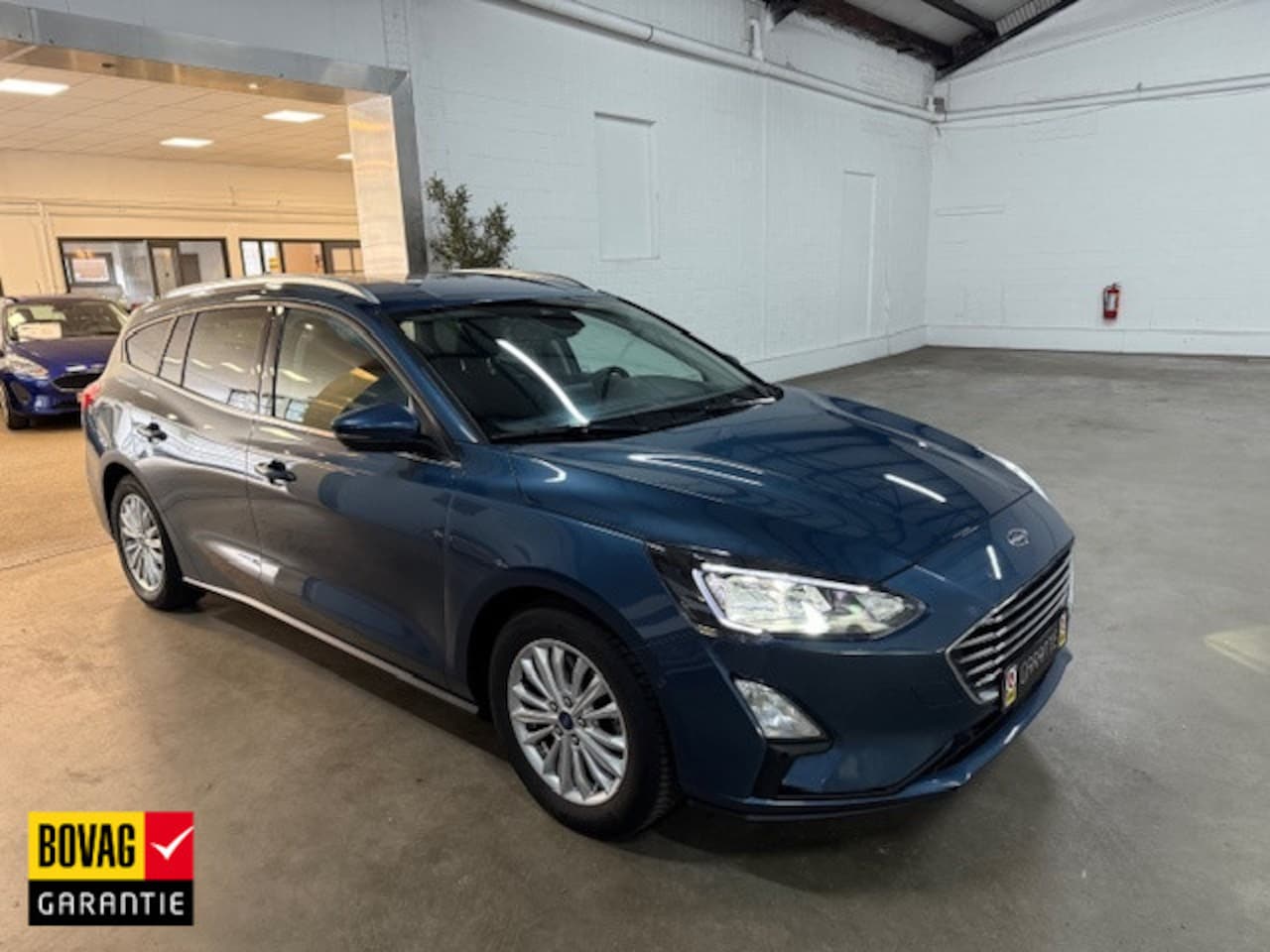 Ford Focus Wagon - 1.0 EcoB. Tit. XBns AUTOMAAT - AutoWereld.nl