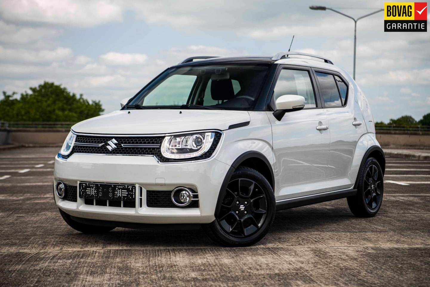 Suzuki Ignis - 1.2 Smart Hybrid Stijl | Airco/Clima | Cruise Control | Navigatie | Stoelverwarming | LM V - AutoWereld.nl