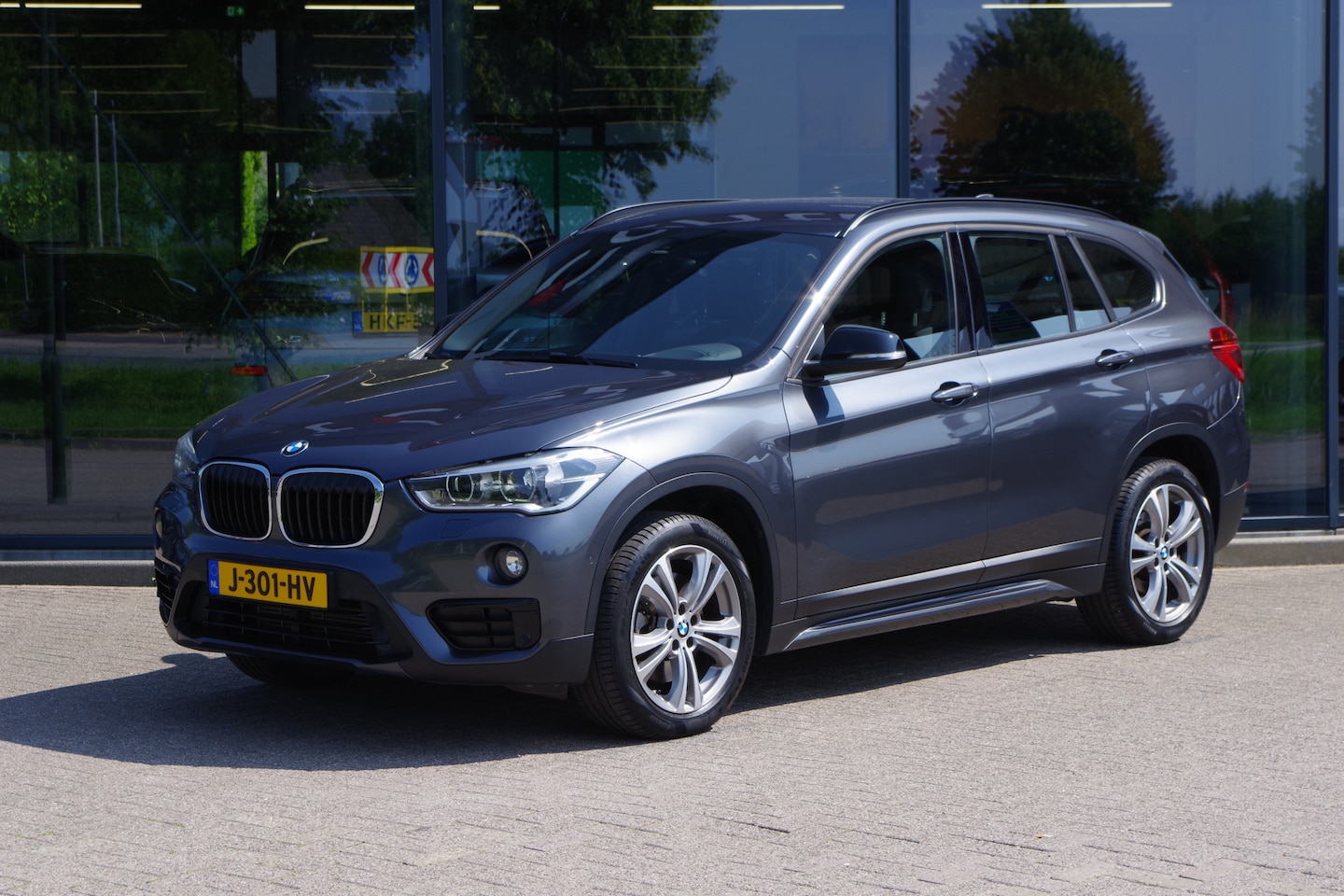 BMW X1 - xDrive20i 192 PK Automaat High Executive, Head-Up, Climate Control, Trekhaak, Sportstoelen - AutoWereld.nl