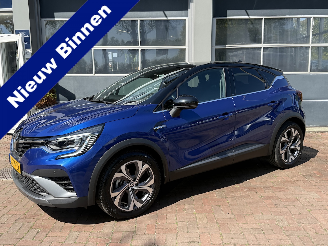 Renault Captur - 1.6 E-Tech Hybrid 145 R.S. Line | Navi | LED | Clima | PDC  09-2021 133.359 KM - AutoWereld.nl