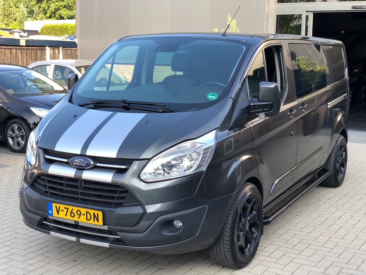 Ford Transit Custom - 2.0 TDCI 170pk L2H1 Limited DUBBELE CABINE LEER NAVI XENON CRUISE CAMERA PDC - AutoWereld.nl