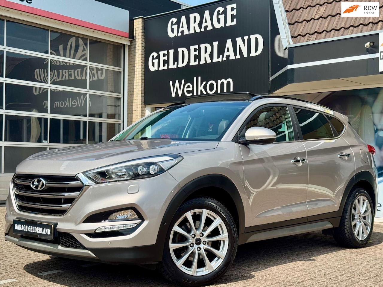 Hyundai Tucson - 1.6 177PK Premium | Pano | Volleder | Navi | Camera | Xenon | Apple/Android | Cruise | Cli - AutoWereld.nl