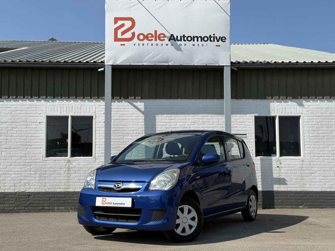 Daihatsu Cuore - 1.0 Premium 5-Deurs / Airco / Nwe APK+Koppeling! - AutoWereld.nl