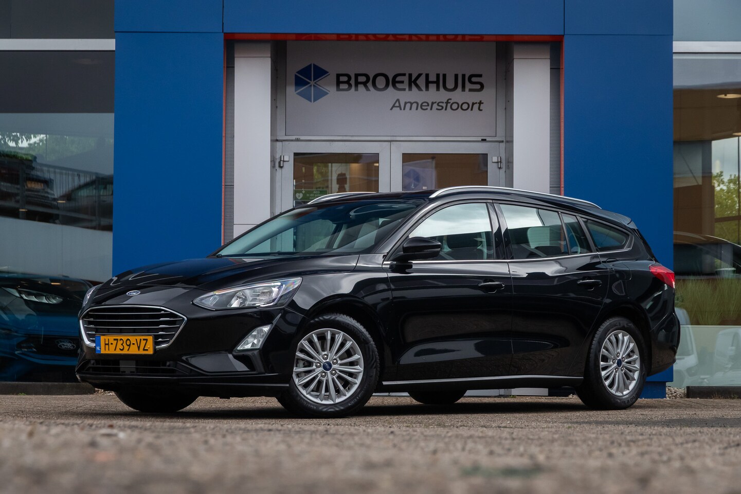 Ford Focus Wagon - 1.0 EcoBoost Titanium Business | Apple Carplay/Android Auto | Clima | Cruise | Navigatie | - AutoWereld.nl