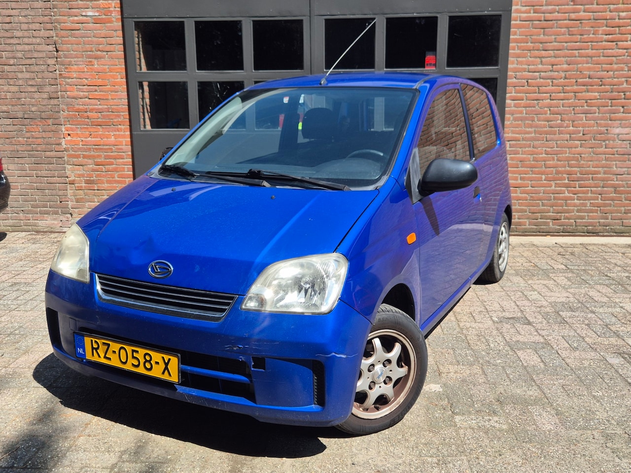 Daihatsu Cuore - 1.0-12V Tokyo /Airco/ word geleverd met nieuwe apk! - AutoWereld.nl