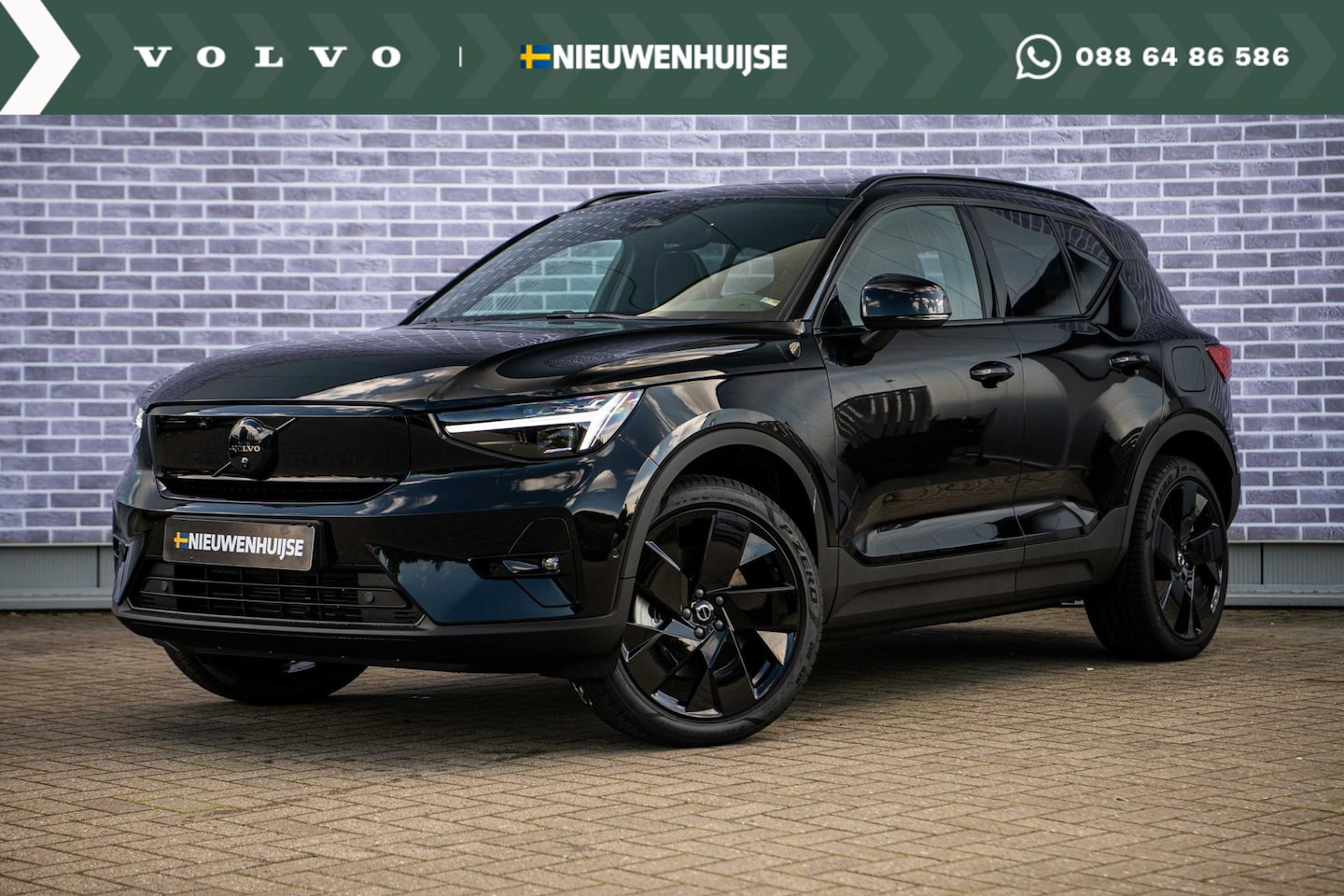 Volvo EX40 - Twin Motor Performance Ultra Black Edition 82 kWh | Uit Voorraad Leverbaar | Panoramadak | - AutoWereld.nl