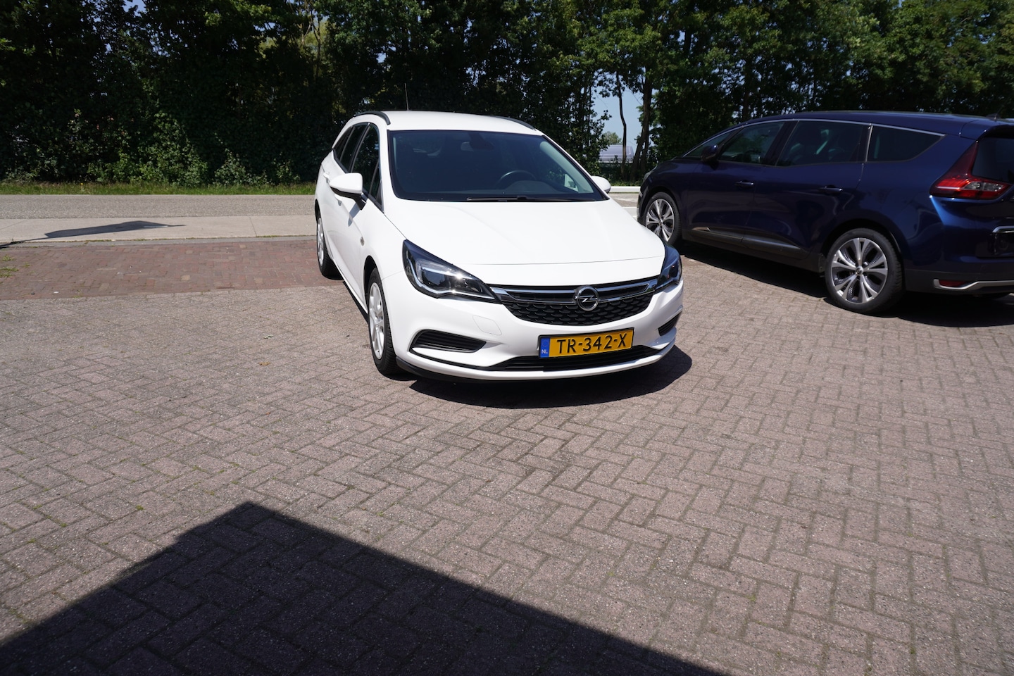 Opel Astra Sports Tourer - 1.0 Turbo Business+ CRUISE NAVI - AutoWereld.nl