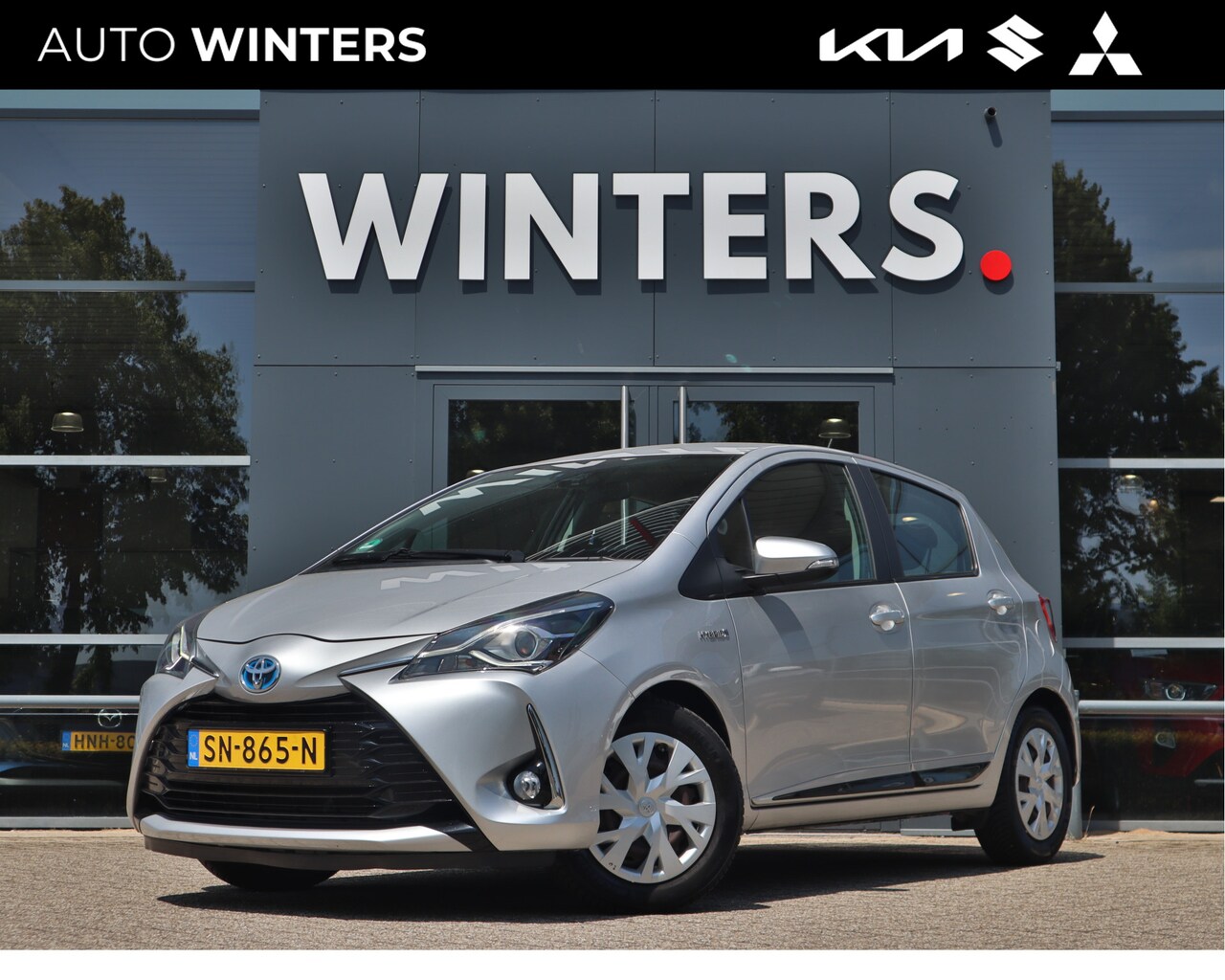 Toyota Yaris - 1.5 Hybrid Design Red | Camera | Climate Control | Cr.Control | 15"LMV | BT | Keyless | - AutoWereld.nl