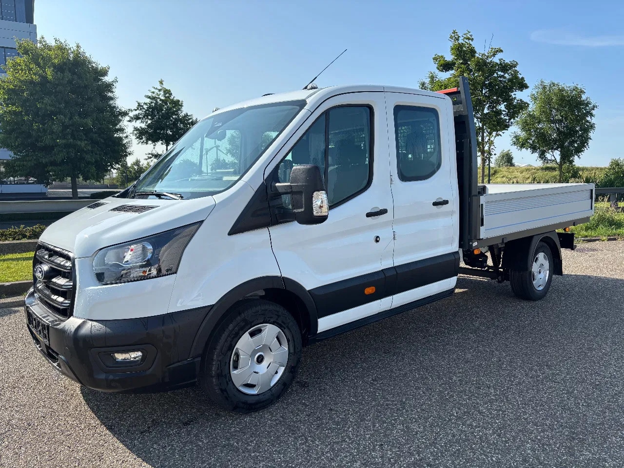 Ford Transit - Dubbelcabine Openlaadbak Airco Cruisecontrol Trekhaak 130PK BPM VRIJ NIEUW - AutoWereld.nl
