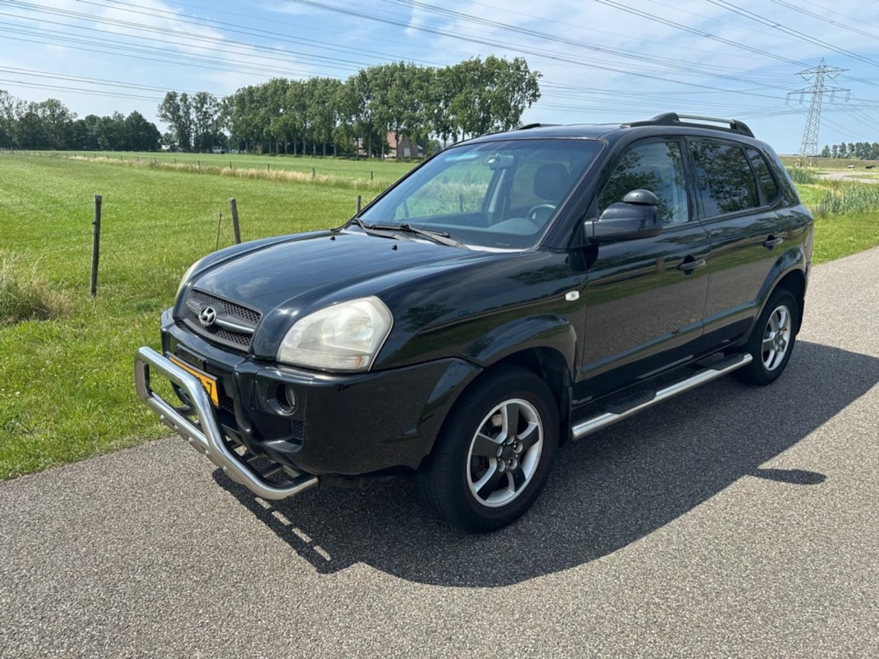 Hyundai Tucson - 2.0i Style LEDER | TREKHAAK | CLIMA ! - AutoWereld.nl