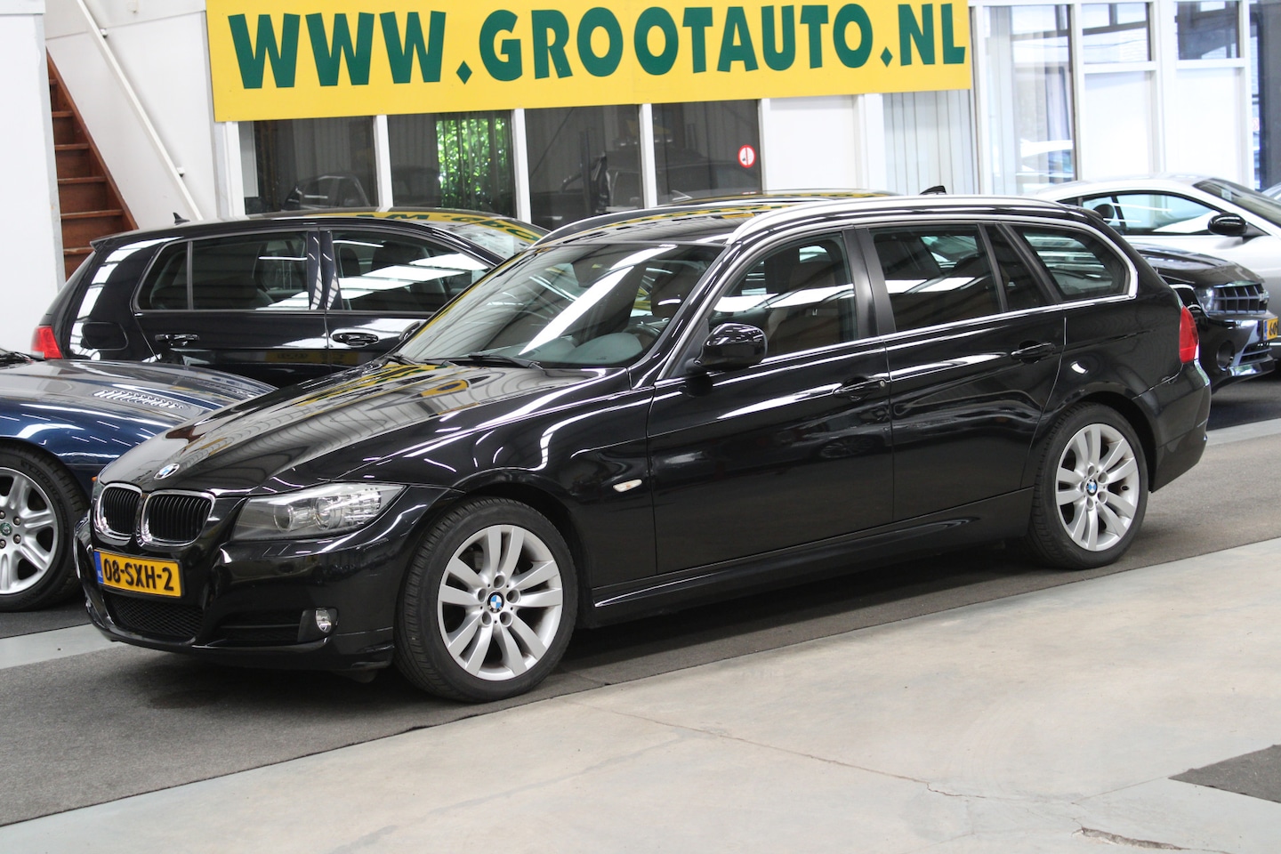 BMW 3-serie Touring - 318i Corporate Lease Luxury Line NAP, Airco, Leder, Cruise control - AutoWereld.nl