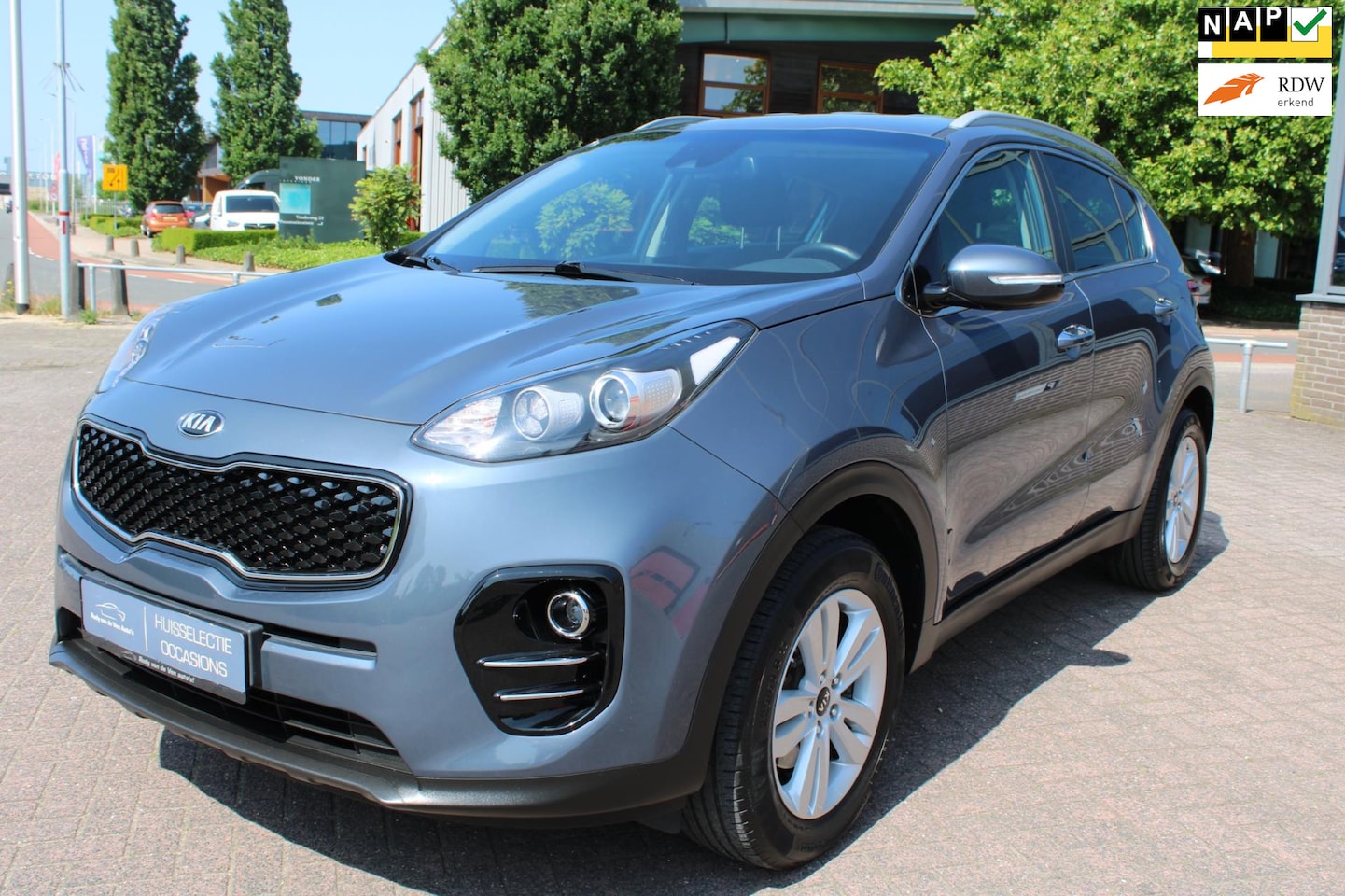 Kia Sportage - 1.6 GDI ComfortLine Navigator Dream Team - AutoWereld.nl