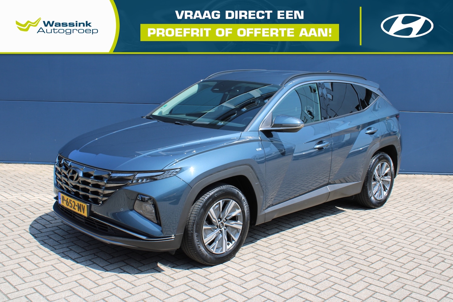 Hyundai Tucson - 1.6 T-GDi 48V 150pk Comfort | Climate Control | Navigatie | Camera | Apple Carplay | Trekh - AutoWereld.nl