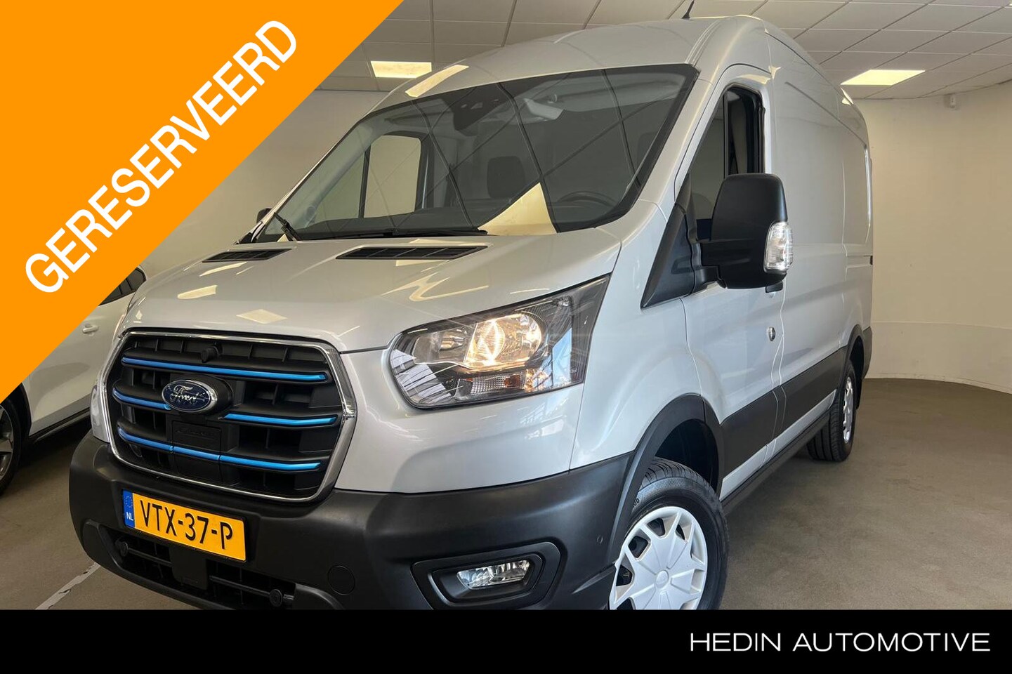 Ford E-Transit - 350 L2H2 Trend 68 kWh | Laadklep | BLIS | Camera | Navigatie | Alarm Klasse 3 - AutoWereld.nl