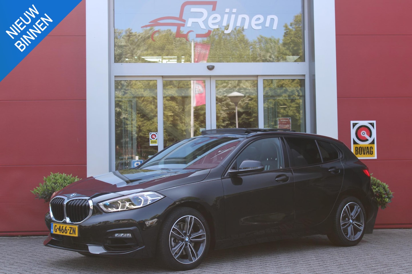 BMW 1-serie - 118i 140PK AUTOMAAT EXECUTIVE EDITION | PANORAMISCH SCHUIF/KANTELKDAK | AFNEEMBARE TREKHAA - AutoWereld.nl