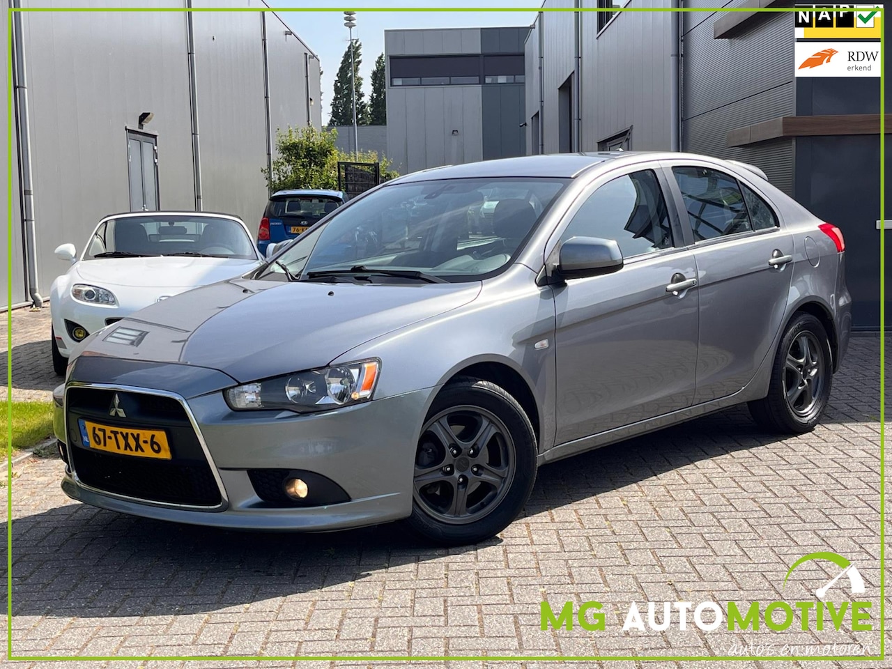 Mitsubishi Lancer Sportback - 1.6 Edition Two | LEDER | Keyless | Climate | PDC | NL auto - AutoWereld.nl