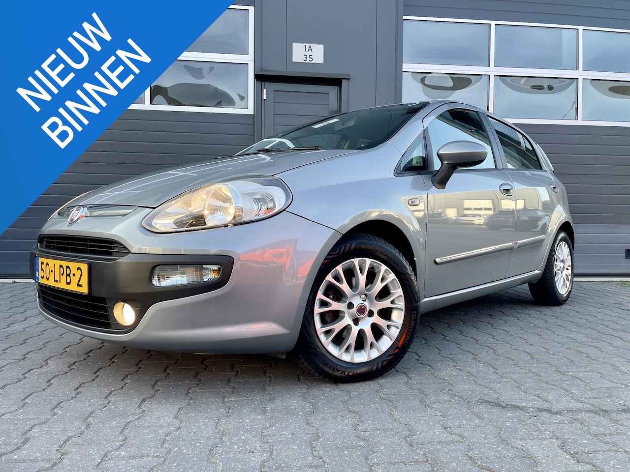 Fiat Punto Evo - 1.4-16V Multiair Dynamic *106PK*CRUISE*ECC*BOMVOL - AutoWereld.nl