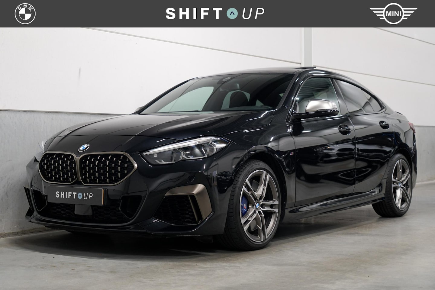 BMW 2-serie Gran Coupé - M235i xDrive Panoramadak | Head Up | Stuurverwarming - AutoWereld.nl