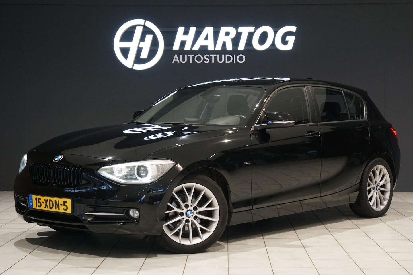 BMW 1-serie - 116i Business+ + SPORTSTOELEN / NAVIGATIE / - AutoWereld.nl