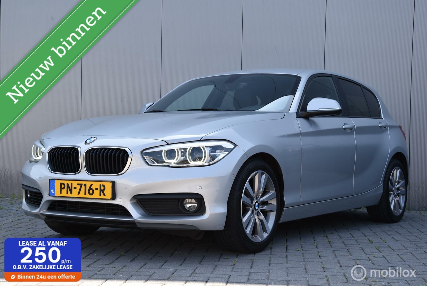 BMW 1-serie - 118i Corporate Lease Executive | Leer | Camera | Stoelverwarming | Clima | - AutoWereld.nl