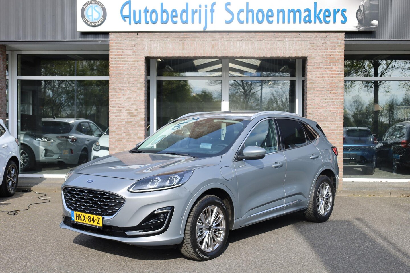 Ford Kuga - 2.5 PHEV Vignale HUD LEER+MEMORY ACC CARPLAY CAMERA DAB NAVI ELEK.LAADKLEP RUIT/STUUR/4xST - AutoWereld.nl