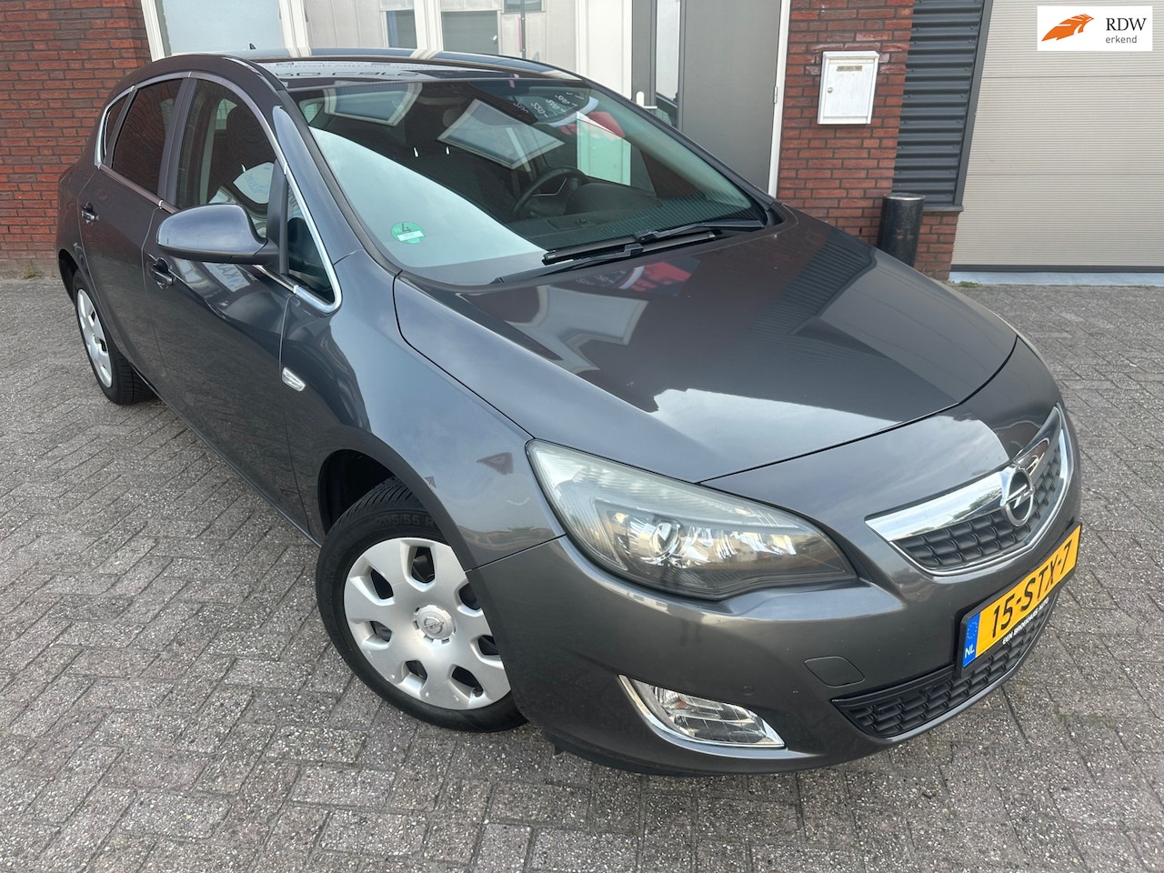 Opel Astra - 1.4 Turbo Cosmo / Navi / PDC / Cruise / NAP / AUX - AutoWereld.nl