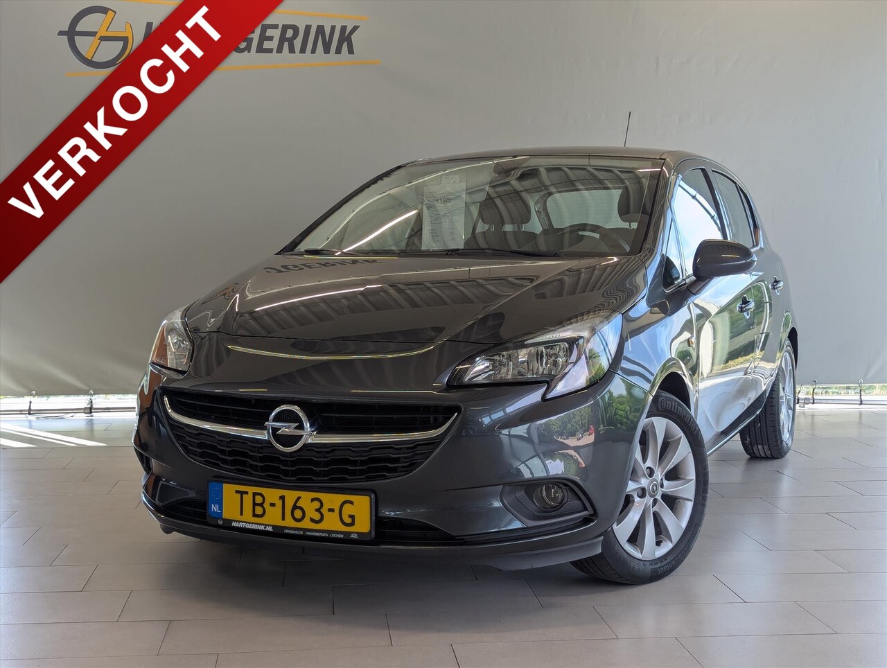 Opel Corsa - 1.4 90pk 5d Favourite *Airco/Navi* - AutoWereld.nl