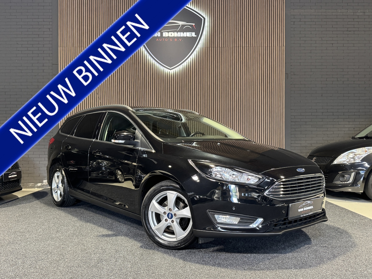 Ford Focus Wagon - 1.0 125PK EcoBoost Titanium ClimaC.CruiseC.Navi.Pdc.LMV!! - AutoWereld.nl