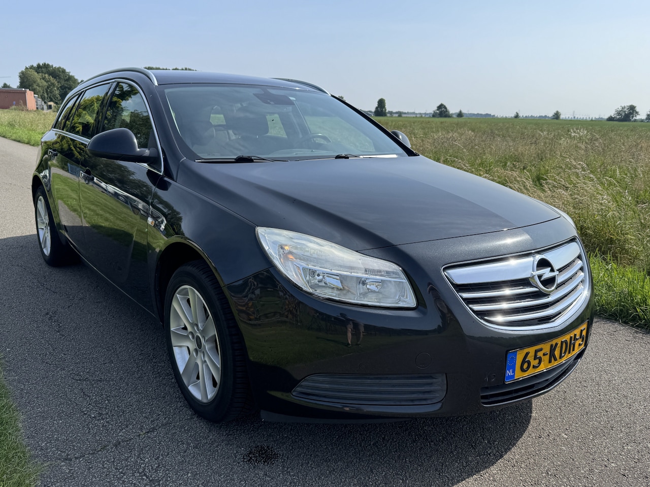 Opel Insignia Sports Tourer - 1.6 T Edition NAVI/PDC/ECC - AutoWereld.nl