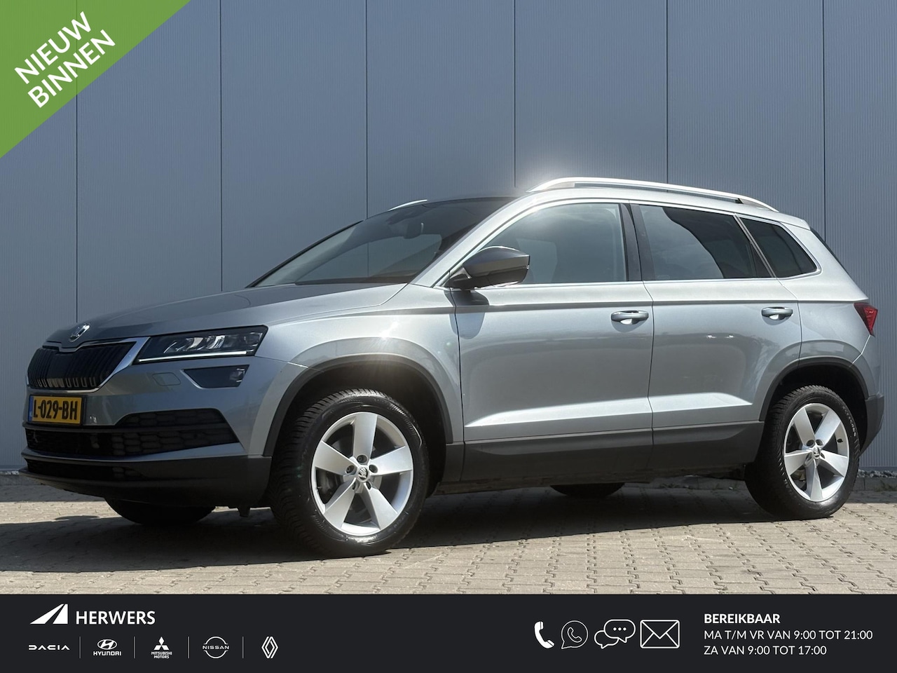 Skoda Karoq - 1.5 TSI ACT Sportline Business / Automaat / Navigatie / Apple Carplay/Android Auto / Stoel - AutoWereld.nl