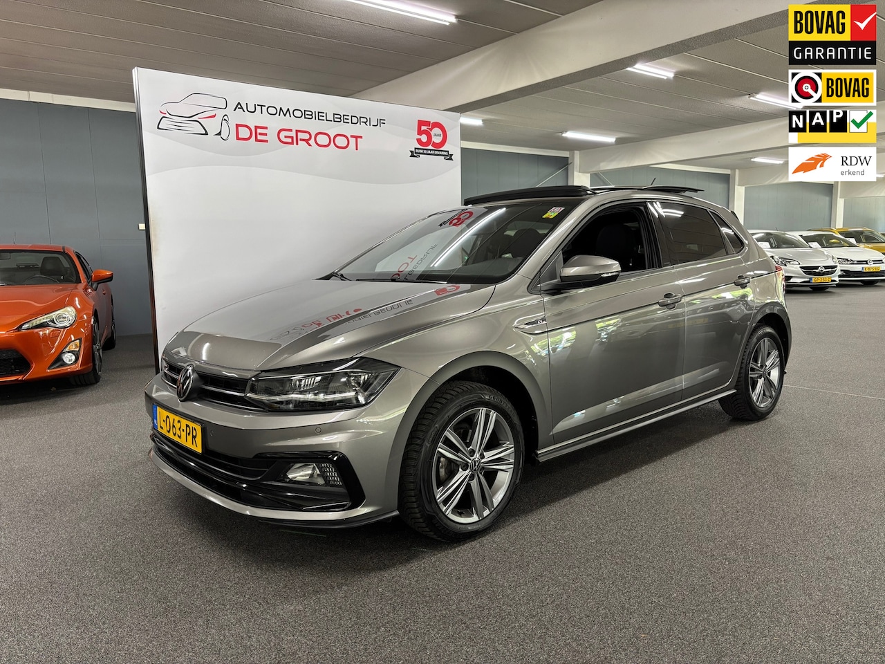 Volkswagen Polo - 1.0 TSI Highline Business R / NL-auto, Eerste eigenaar, Stoelverwarming, Panoramadak, Navi - AutoWereld.nl