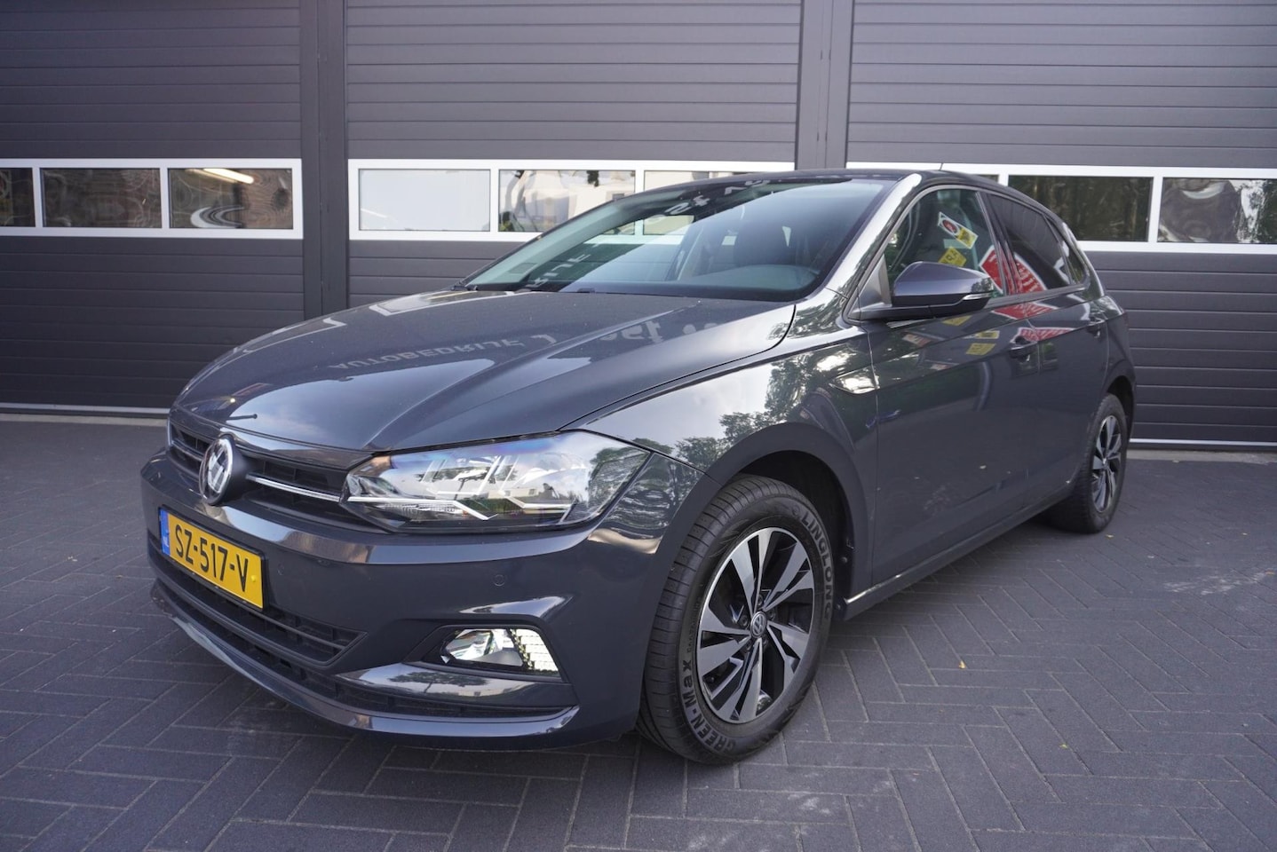 Volkswagen Polo - 1.0 TSI Comfortline Business Airco/Navi/CC/Park.sensoren/Carplay - AutoWereld.nl