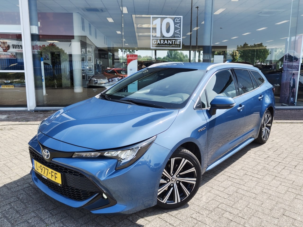 Toyota Corolla Touring Sports - 1.8 Hybrid Dynamic | Keyless Entry | Stoelverwarming | DAB+ | An - AutoWereld.nl