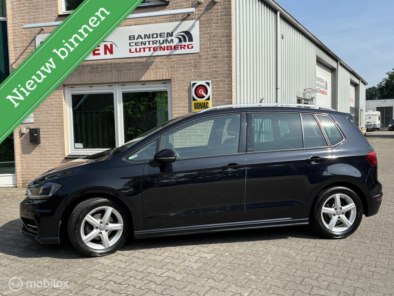Volkswagen Golf Sportsvan - 1.2 Tsi Comfortline DSG - AutoWereld.nl