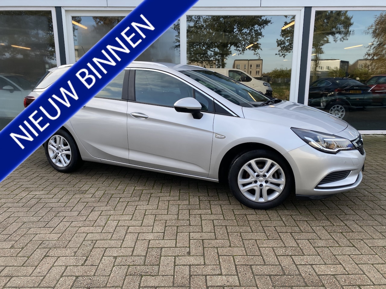 Opel Astra Sports Tourer - 1.0 Turbo Business+ 50% deal 5975,- ACTIE Sportstoelen / Navi  / Clima / Cruise / Telefoon - AutoWereld.nl