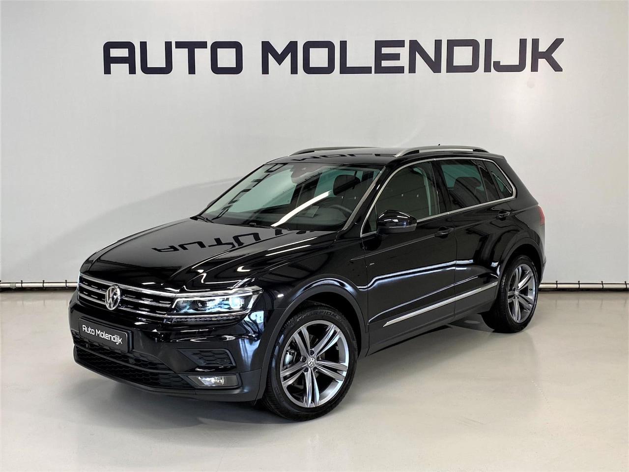 Volkswagen Tiguan - 1.5 TSI ACT 150 PK DSG Navi / Full LED / Head up display / el. trekhaak - AutoWereld.nl
