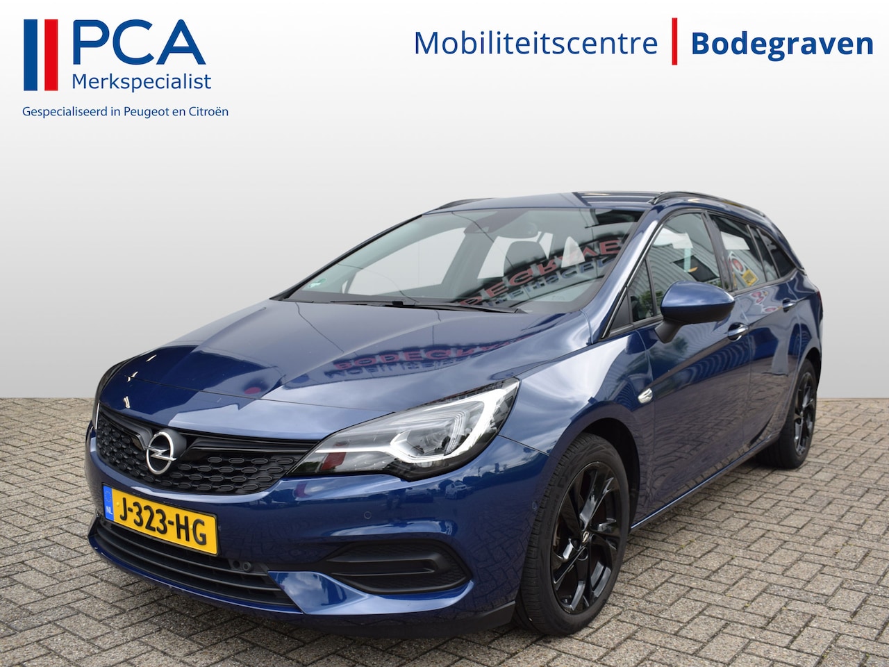 Opel Astra Sports Tourer - 1.2 Elegance | 130PK | AGR Stoelen | Park Assist - AutoWereld.nl